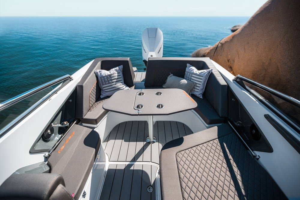 Nordkapp Noblesse 790 stern lounger seats with table and mercury engine