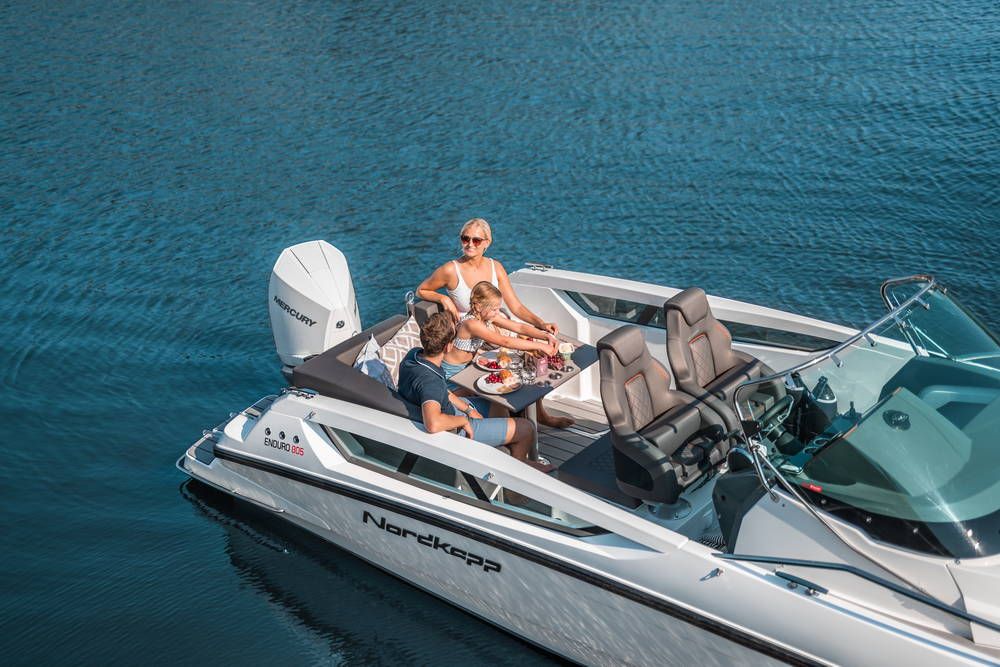 Nordkapp Enduro 805 with couple sat on seats at the stern