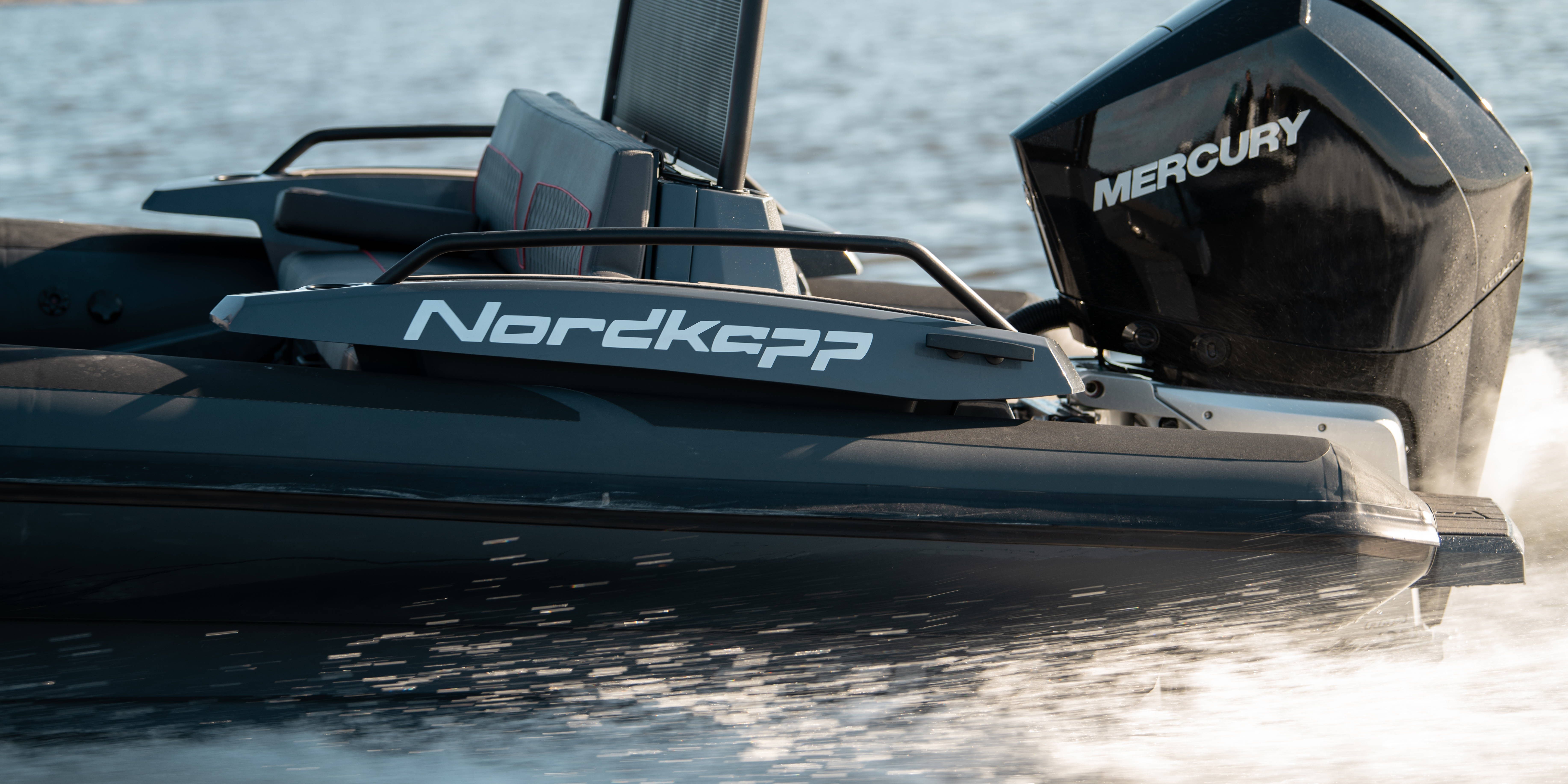 Airborne 8 RIB port stern logo and mercury outboard engine on water