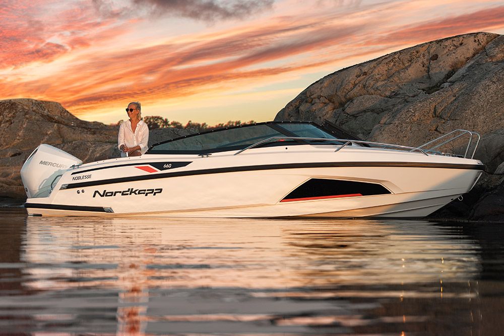 Nordkapp Noblesse 660 moored at sea during sunset