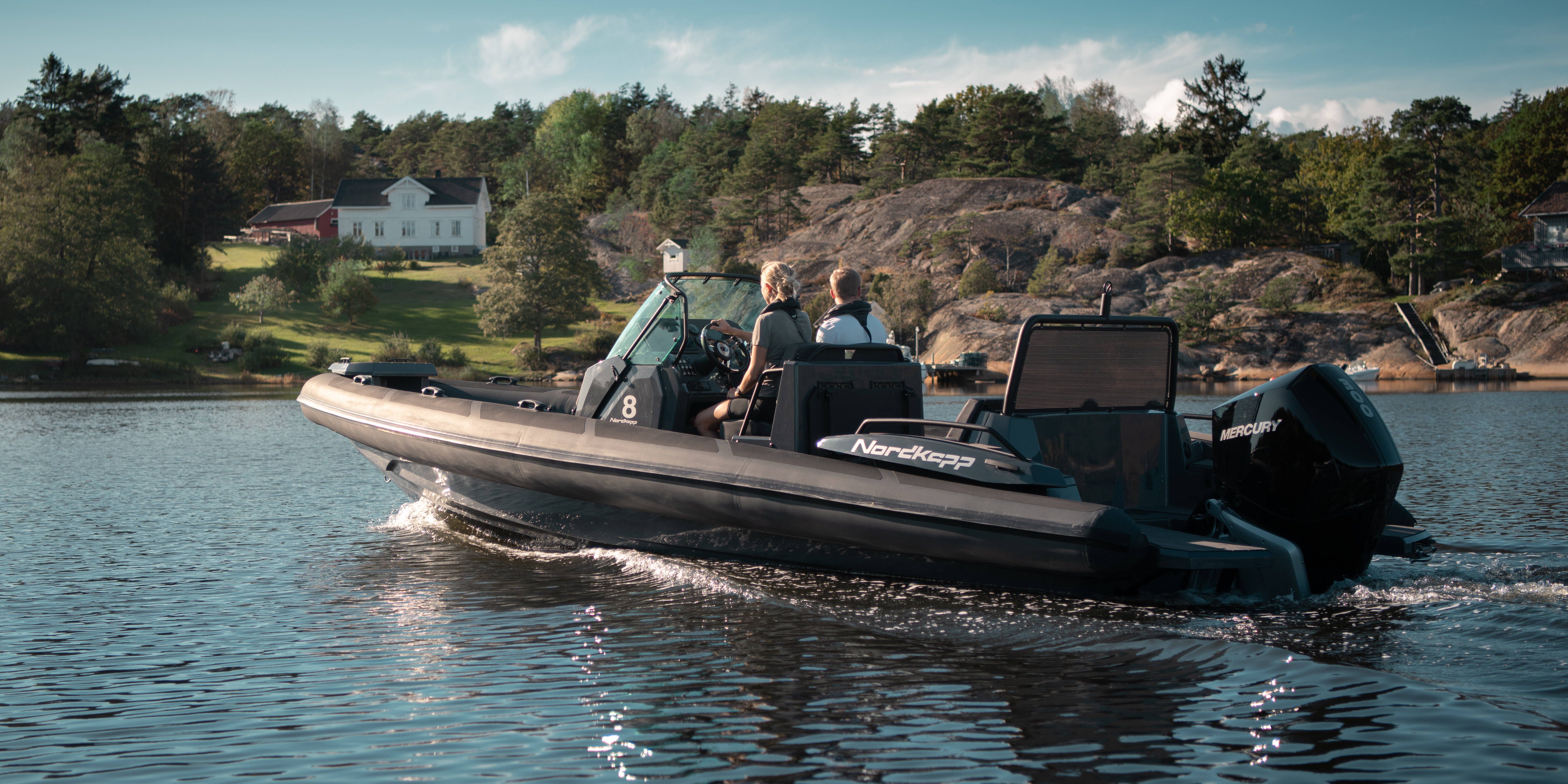 Airborne 8 RIB on water with couple